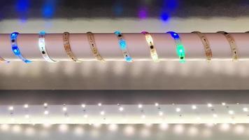 A coiled LED light chain that flashes in different colors. video