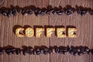 English word Coffee, made up of salt cracker letters photo