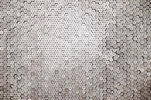 Pattern of 12 gauge cartridges for shotgun bullets. Shells for hunting rifle close up. Backdrop for shooting range or ammunition trade concepts photo
