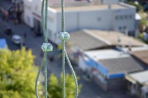 Rope lockers in of suspended wire rope platform for facade works on high multistorey buildings. Rope lockers blocks kink for safety platform usage photo