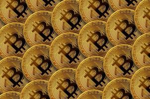 Pattern of many golden bitcoins. Cryptocurrency mining concept photo