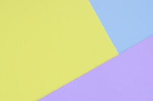 Texture background of fashion pastel colors. Violet, yellow, and blue geometric pattern papers. minimal abstract photo