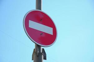 Road sign in the form of a white rectangle in a red circle photo