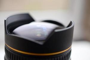 Fragment of a wide angle lens for a modern SLR camera. A photograph of a fisheye lens with a minimal focal length photo