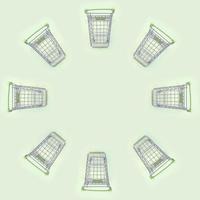 Pattern of many small shopping carts on a lime background photo