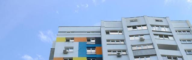 New multy storey residential building and blue sky photo