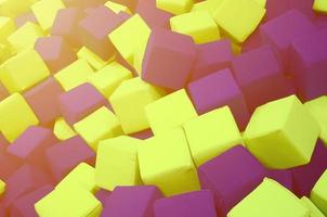 Many colorful soft blocks in a kids' ballpit at a playground photo