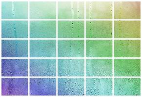 A collage of many different fragments of glass, decorated with rain drops from the condensate. Spring tones with green and blue colors photo
