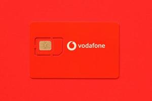 TERNOPIL, UKRAINE - JULY 5, 2022 Vodafone Power SIM mobile card by Vodafone group plc - British multinational telecommunications company who operates networks in 22 countries photo