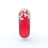 Red capsule tablet with red and white fractions inside. 3D render of a pill. photo