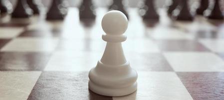 Single pawn against many enemies as a symbol of difficult unequal fight or struggle of minorities. photo
