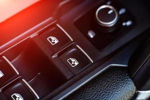 power window control buttons in the car close-up photo