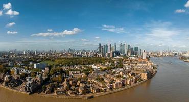 Aerial panoramic skyline view of Canary Wharf, the worlds leading financial district in London, UK. photo