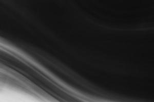 Horizontal black background with gray waves photo