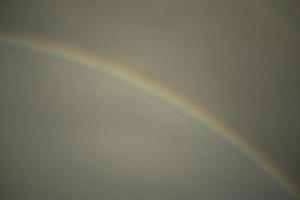 Rainbow in sky. After rain. Phenomenon of nature. photo