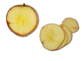 Apple slices on white photo
