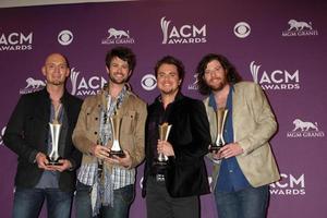 LAS VEGAS - APR 1 - Eli Young Band in the press room at the 2012 Academy of Country Music Awards at MGM Grand Garden Arena on April 1, 2010 in Las Vegas, NV photo