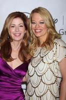 LOS ANGELES - AUG 7 - Dana Delany, Jeri Ryan arriving at the Disney  ABC Television Group 2011 Summer Press Tour Party at Beverly Hilton Hotel on August 7, 2011 in Beverly Hills, CA photo