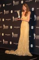 LAS VEGAS - APR 3 - Taylor Swift in the Press Room at the Academy of Country Music Awards 2011 at MGM Grand Garden Arena on April 3, 2010 in Las Vegas, NV photo