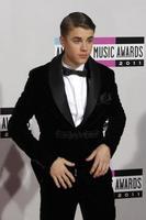 LOS ANGELES - NOV 20 - Justin Bieber arrives at the 2011 American Music Awards at Nokia Theater on November 20, 2011 in Los Angeles, CA photo