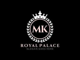 Letter MK Antique royal luxury victorian logo with ornamental frame. vector