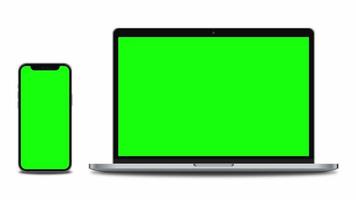 Smartphone and laptop with green screen slide into the camera frame. 4K animation for presentation on mockup screen video