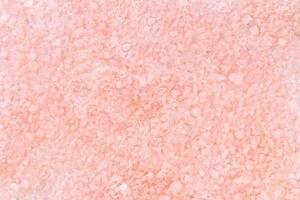 Beige pink background. Sea salt. Texture. spa backdrop photo