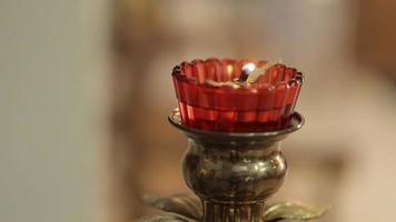 a lamp in front of an icon in an Orthodox church. video