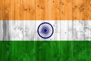 Flag of India on the texture of wooden planks. photo