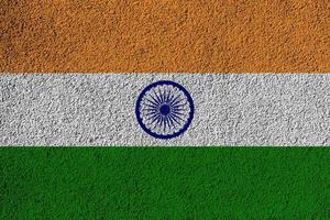 Flag of India on a cement wall texture. photo