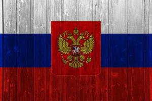 Flag of the Russian Federation on the texture of wooden planks. photo