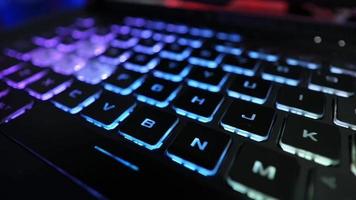 Close up of computer keyboard with multicolor lighting video