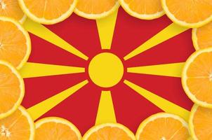 Macedonia flag  in fresh citrus fruit slices frame photo