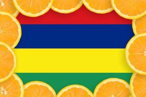 Mauritius flag  in fresh citrus fruit slices frame photo