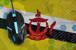 Brunei Darussalam flag  and computer mouse. Digital threat, illegal actions on the Internet photo