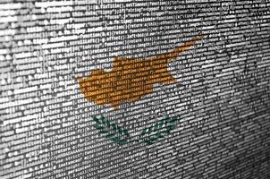 Cyprus flag  is depicted on the screen with the program code. The concept of modern technology and site development photo