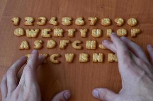 Hands on cracker keyboard buttons photo