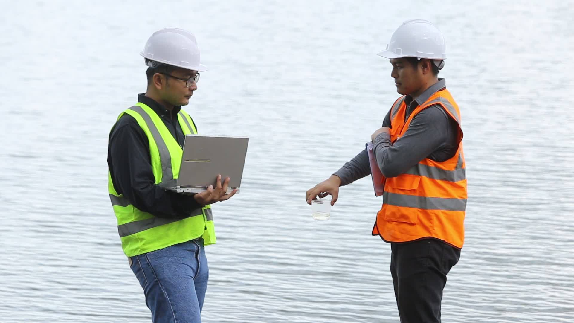 Environmental engineers work at wastewater treatment plants,Water