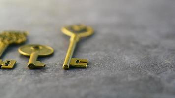 Close up of vintage gold skeleton keys with shallow depth of field video