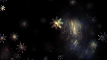 Loop abstract multicooired dark snowflakes on black background video