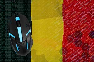 Belgium flag  and computer mouse. Digital threat, illegal actions on the Internet photo
