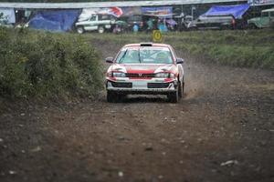 YOGYAKARTA, INDONESIA - October 16, 2022 - Racers compete in the King's Cup Sprint Rally Jogja photo