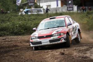 YOGYAKARTA, INDONESIA - October 16, 2022 - Racers compete in the King's Cup Sprint Rally Jogja photo