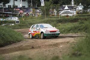 YOGYAKARTA, INDONESIA - October 16, 2022 - Racers compete in the King's Cup Sprint Rally Jogja photo