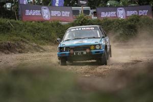 YOGYAKARTA, INDONESIA - October 16, 2022 - Racers compete in the King's Cup Sprint Rally Jogja photo