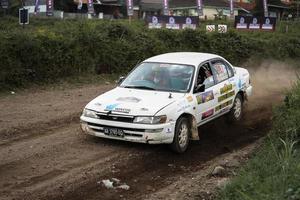 YOGYAKARTA, INDONESIA - October 16, 2022 - Racers compete in the King's Cup Sprint Rally Jogja photo