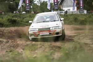 YOGYAKARTA, INDONESIA - October 16, 2022 - Racers compete in the King's Cup Sprint Rally Jogja photo