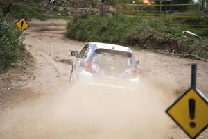 YOGYAKARTA, INDONESIA - October 16, 2022 - Racers compete in the King's Cup Sprint Rally Jogja photo