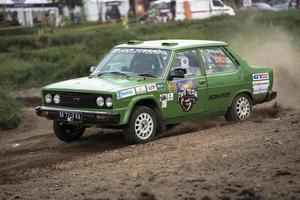 YOGYAKARTA, INDONESIA - October 16, 2022 - Racers compete in the King's Cup Sprint Rally Jogja photo