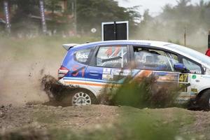 YOGYAKARTA, INDONESIA - October 16, 2022 - Racers compete in the King's Cup Sprint Rally Jogja photo